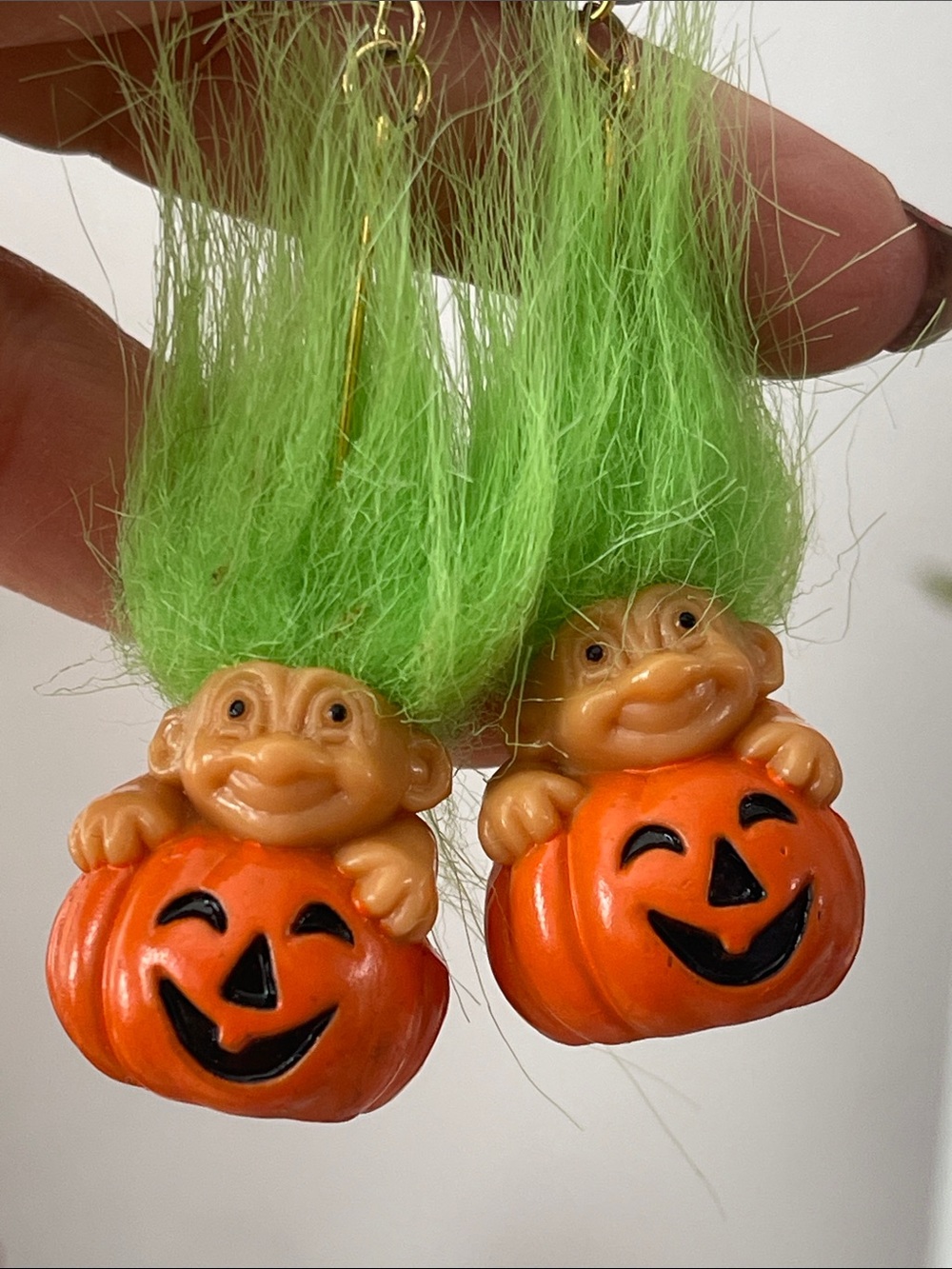 Vintage green-haired Russ Troll in a jack-o-lantern dangle earrings